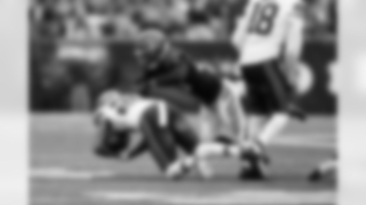 CB Dax Hill makes a tackle against the Cleveland Browns at Paycor Stadium, Sunday, January 7, 2024.