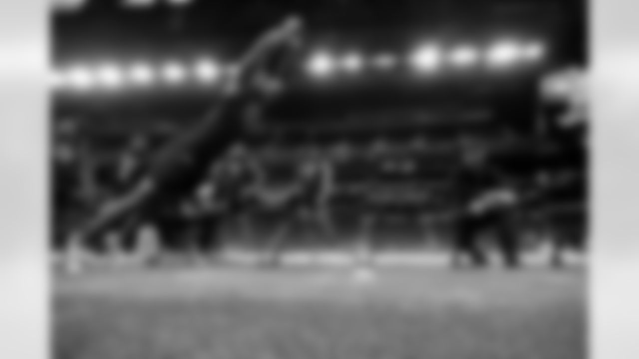 Texas Tech running back Tahj Brooks participates in the broad jump at the NFL football scouting combine in Indianapolis, Saturday, March 1, 2025. (Brooke Sutton via AP)