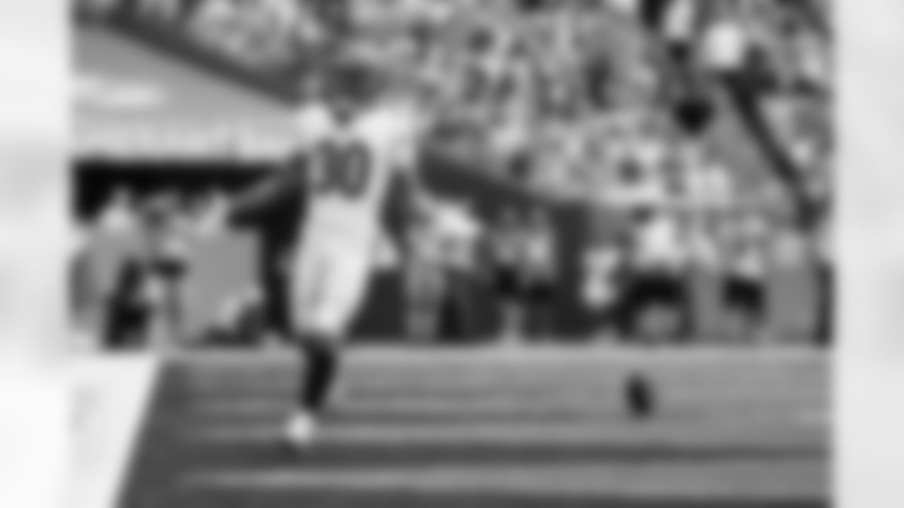 RB Chase Brown celebrates a touchdown during Week 16 against the Miami Dolphins at Hard Rock Stadium, Sunday, Dec. 21, 2025.