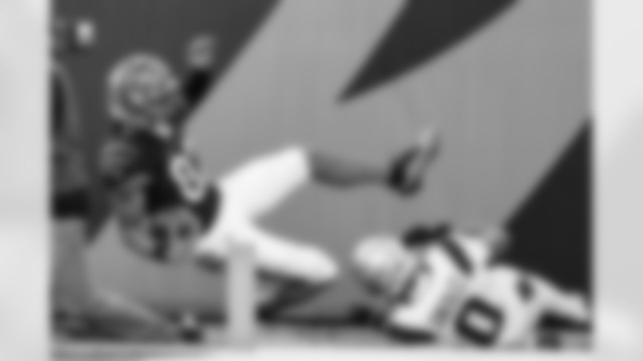 WR Mitch Tinsley scores a touchdown during Week 12 against the New England Patriots at Paycor Stadium, Sunday, Nov. 23, 2025.