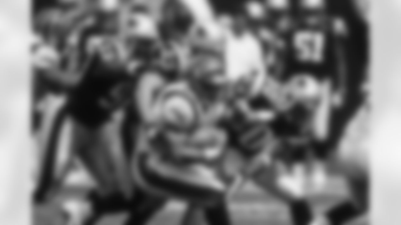 A group of New England Patriots defenders make a tackle against the Cincinnati Bengals on September 9, 2001 in Cincinnati. The Bengals defeated the Patriots 23-17. (Joe Robbins via AP)