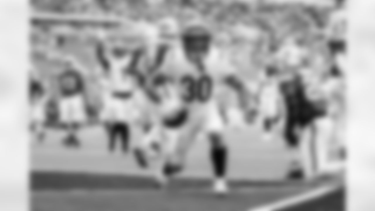 RB Chase Brown during Week 16 against the Miami Dolphins at Hard Rock Stadium, Sunday, Dec. 21, 2025.