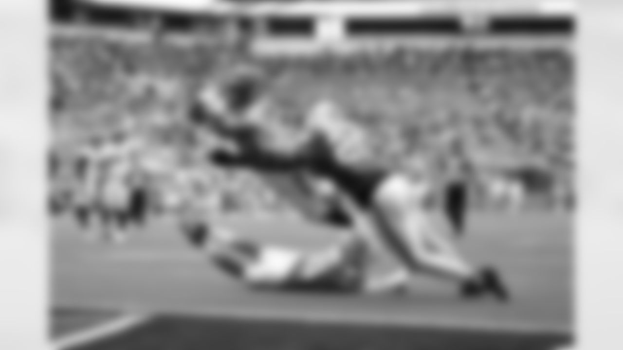 RB Chase Brown scores. touchdown during Week 16 against the Miami Dolphins at Hard Rock Stadium, Sunday, Dec. 21, 2025.