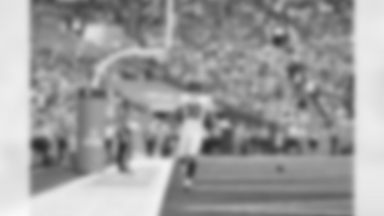 RB Chase Brown celebrates a touchdown during Week 16 against the Miami Dolphins at Hard Rock Stadium, Sunday, Dec. 21, 2025.