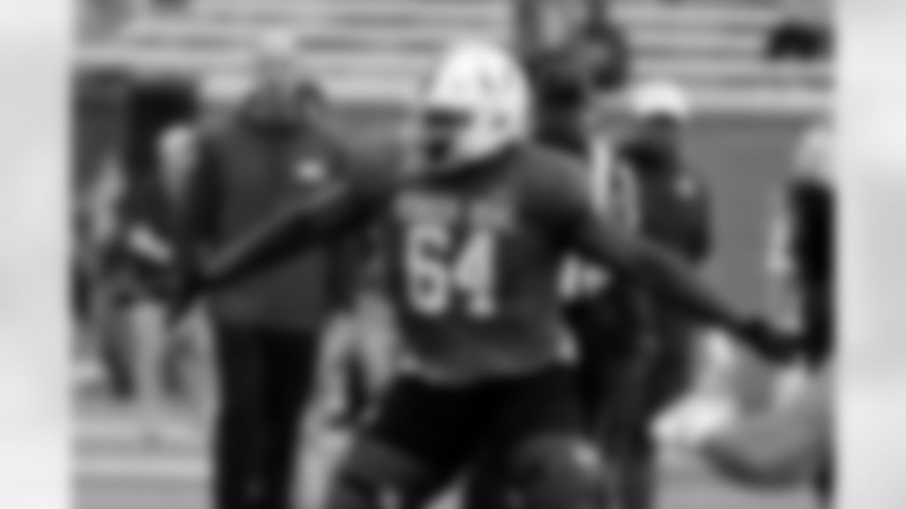 National team offensive lineman Jalen Rivers of Miami (64) runs through drills during practice for the Senior Bowl NCAA college football game, Thursday, Jan. 30, 2025, in Mobile, Ala. (AP Photo/Butch Dill)