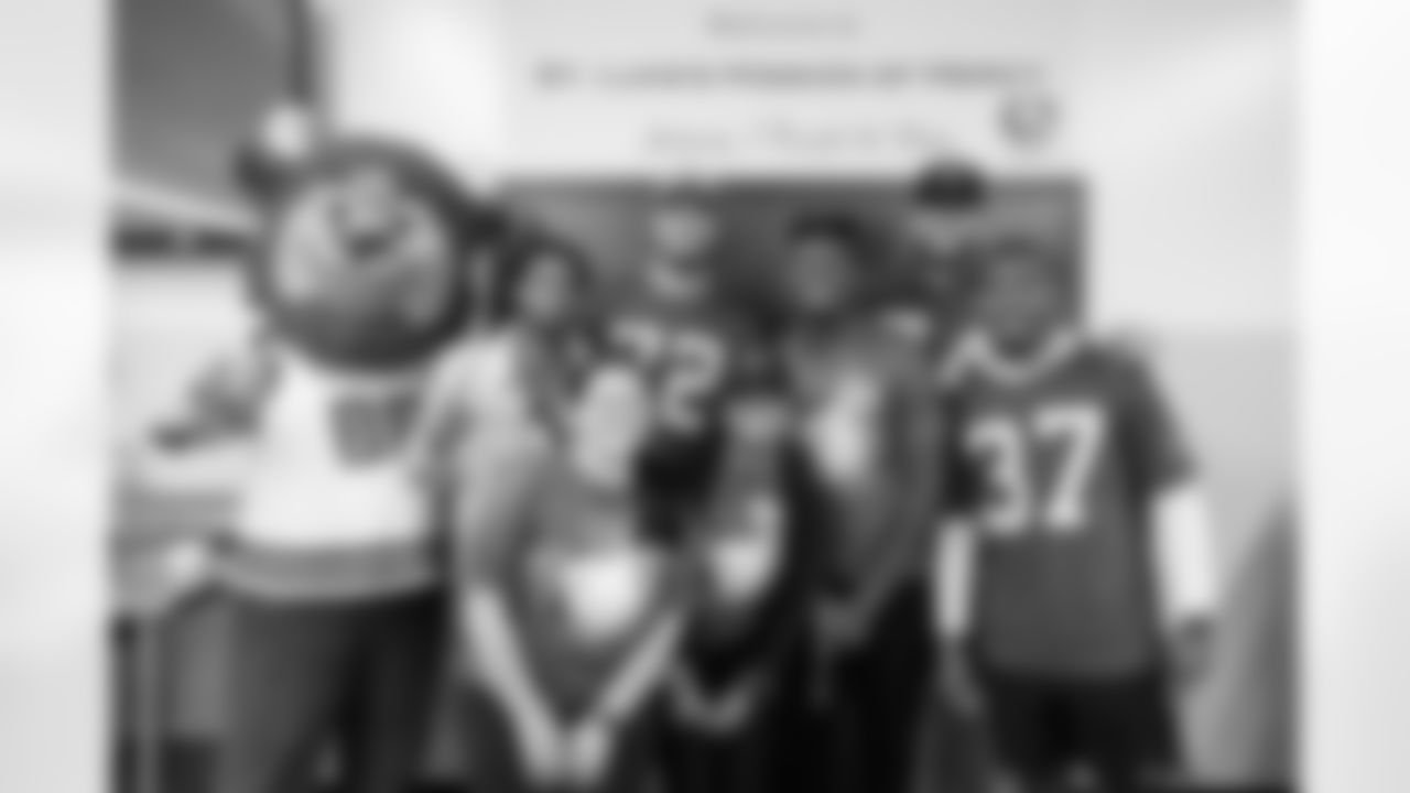 Billy Buffalo, Tommy Doyle (72), Ryan Van Demark (74), Darrynton Evans (37). Buffalo Bills visit St. Luke's Mission of Mercy, September 24, 2024.