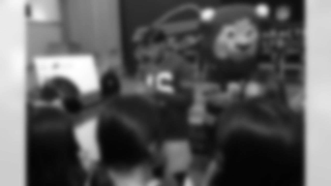Ja'Marcus Ingram (46) and Billy Buffalo at a conversation on mental wellness best practices, May 21, 2025 at the Frank A. Sedita Academy in Buffalo.