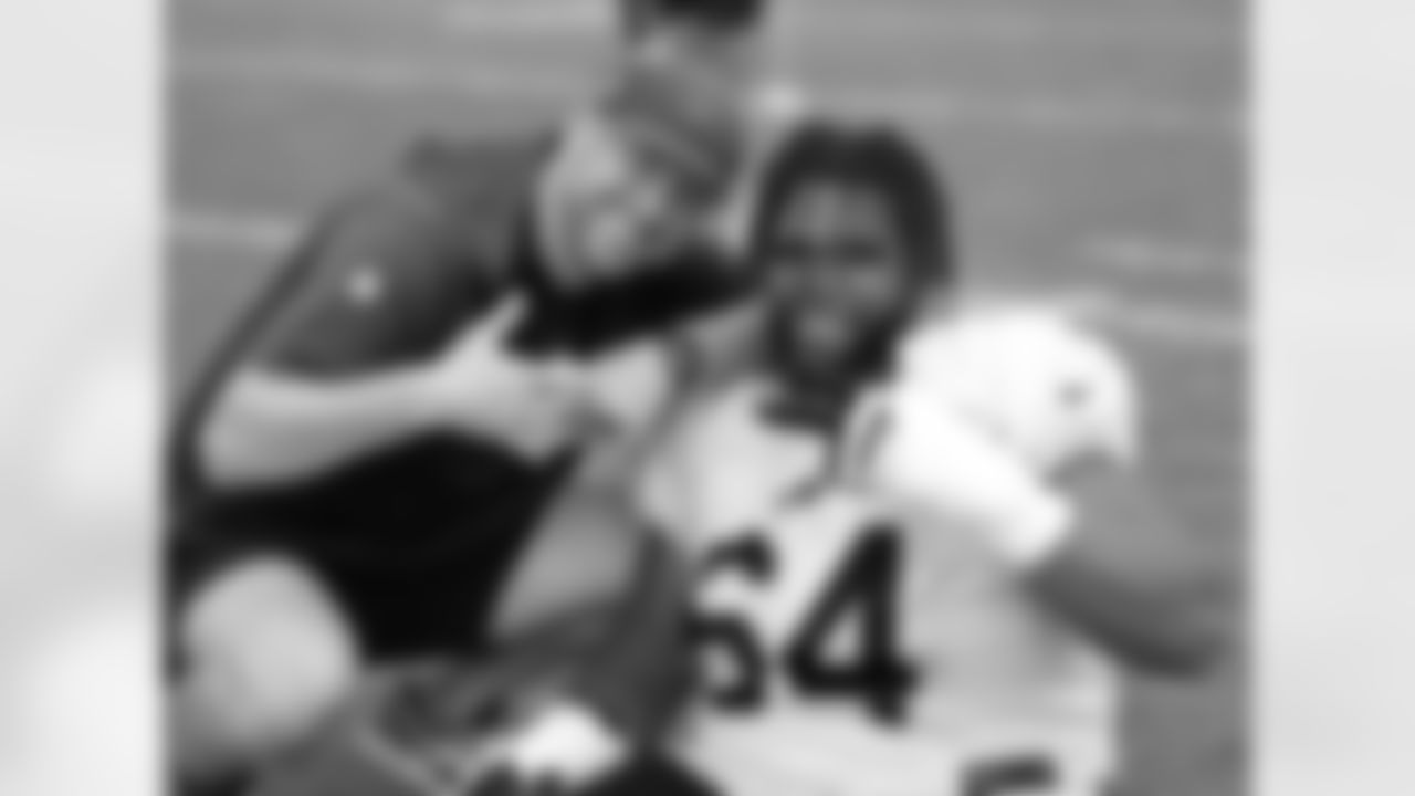 Joe Brady, O'Cyrus Torrence (64). Buffalo Bills Training Camp, August 01, 2024 at St. John Fisher University.