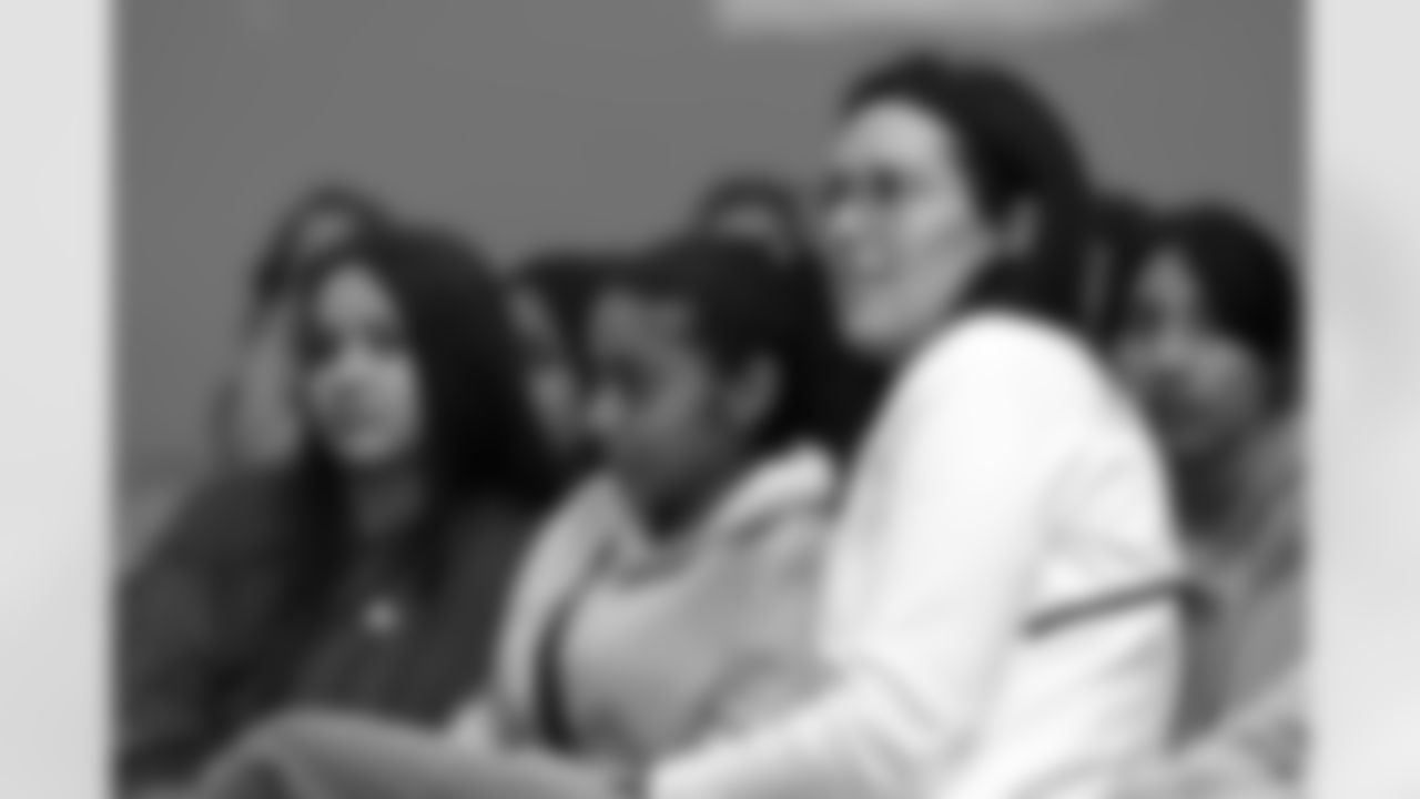 Kate Schrum, Buffalo Bills manager of partnership activation, with students at a panel discussion on mental wellness best practices, May 21, 2025 at the Frank A. Sedita Academy in Buffalo.