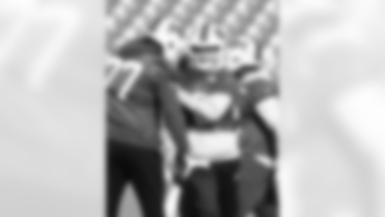 Chase Lundt (77), Shane Buechele (6). Buffalo Bills Week 14 Practice, December 05, 2025 at Highmark Stadium.