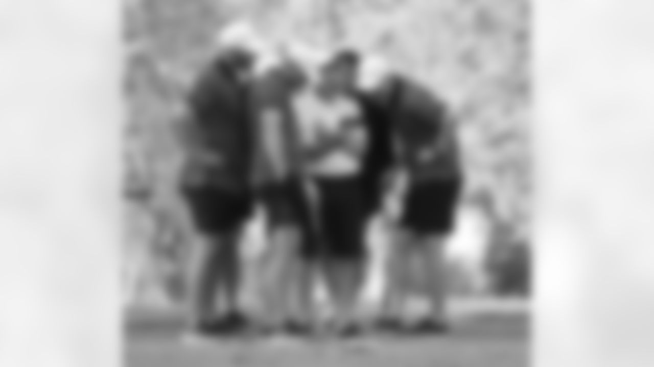 The team of Josh Allen, Mitch Trubisky, Shane Buechele and Joe Brady keep track of their closest opponent's score with Len Vanden Bos. Buffalo Bills players and staff compete in the 4th Annual Buffalo Bills Scramble, May 21, 2024.