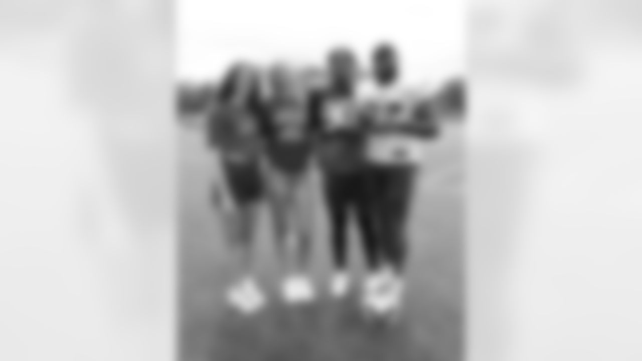 Kentucky women's basketball players Amelia Hassett, Clara Strack with Deone Walker (96), Ray Davis (22). Buffalo Bills Training Camp, August 13, 2025 at Buffalo Bills Training Facility.