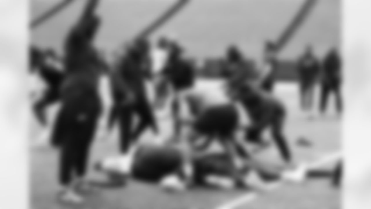 . Buffalo Bills players compete in a four-way tug of war during Phase Two of voluntary off-season workouts, May 19, 2025 at Highmark Stadium.