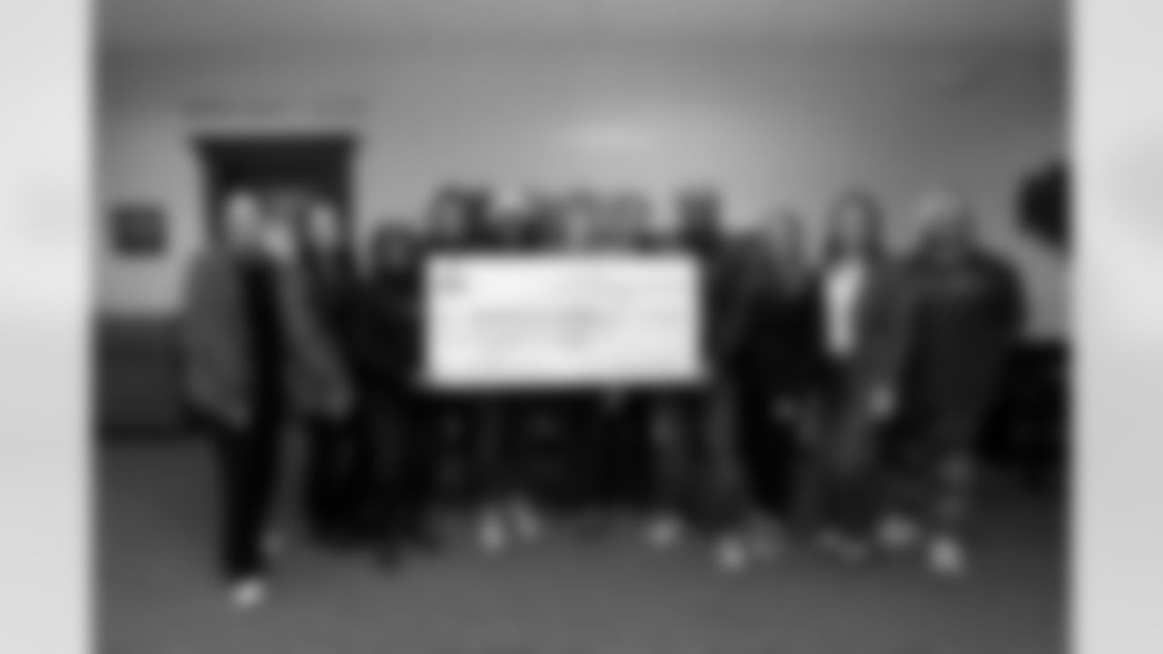 The Bills Foundation presented a $200,000 check to Harvest House Buffalo in support of the First Fruits Pantry and Food as Medicine program.