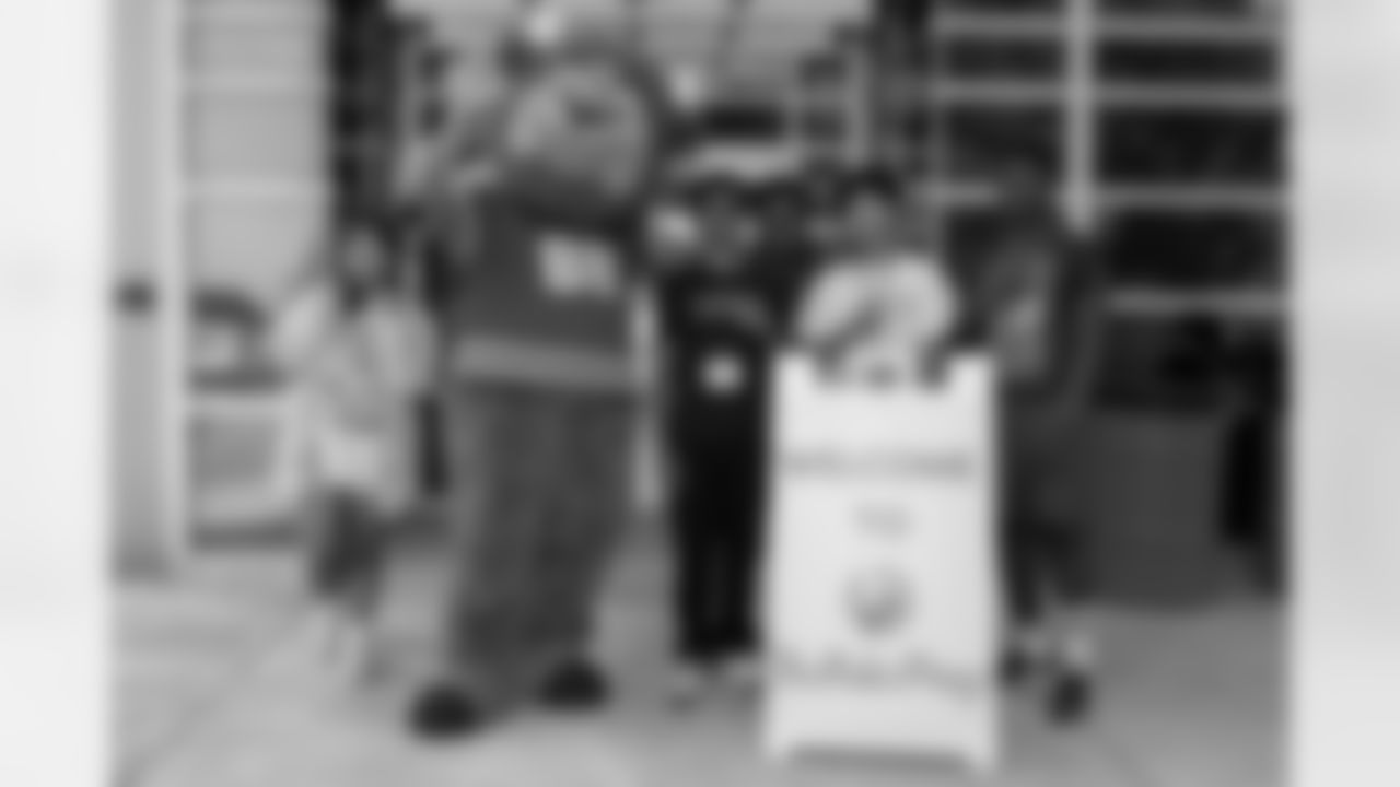 The Bills Foundation presented a $102,500 check to Buffalo Prep in support of the Prep Market, providing scholars with nutritious snacks and meals.