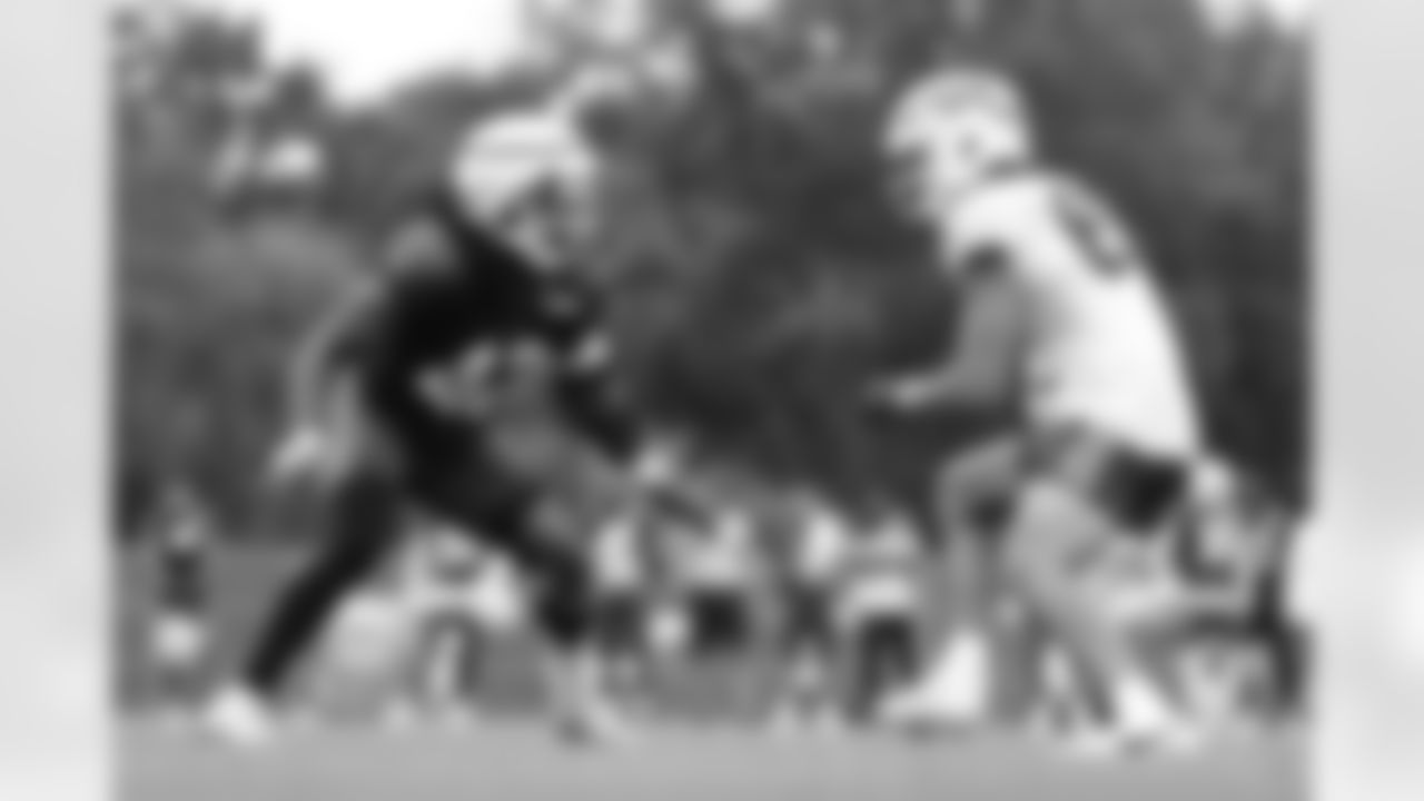 Dorian Williams (42), Keleki Latu (83). Buffalo Bills Training Camp, August 13, 2025 at Buffalo Bills Training Facility.