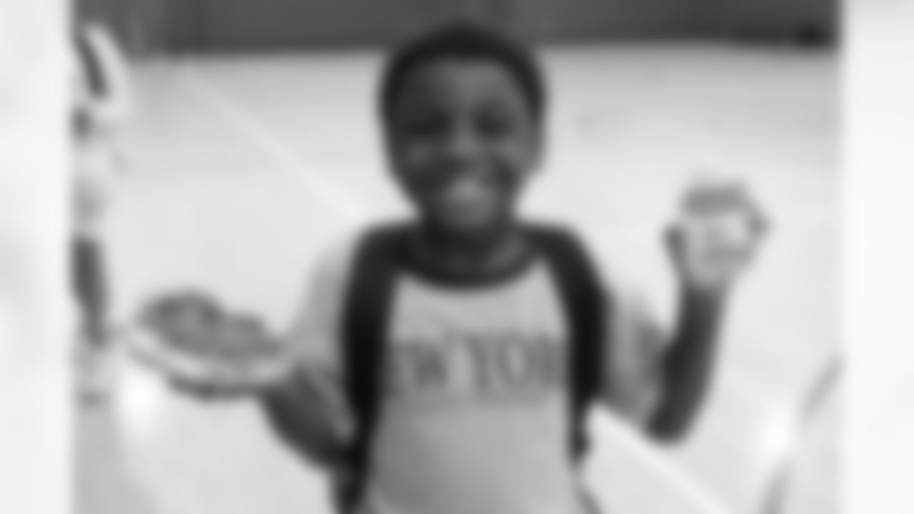 Buffalo Bills wide receiver Elijah Moore sponsors a Back to School Impact Program, July 21, 2025 at the Boys & Girls Club John F. Beecher Clubhouse in Buffalo. Moore donated back to school backpacks and a pizza party for young girls and boys.