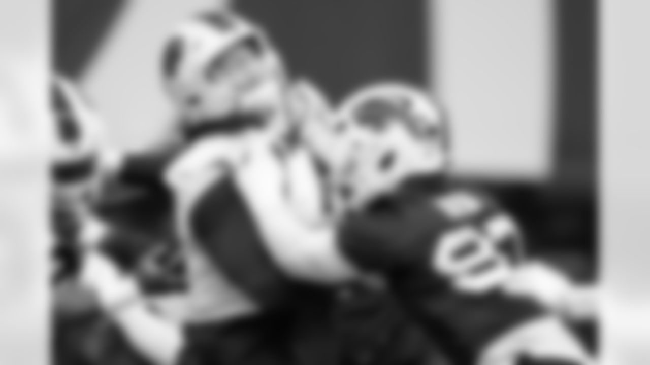 Chase Lundt (77), Joey Bosa (97). Buffalo Bills Week 16 Practice, December 18, 2025 at Buffalo Bills Training Center.