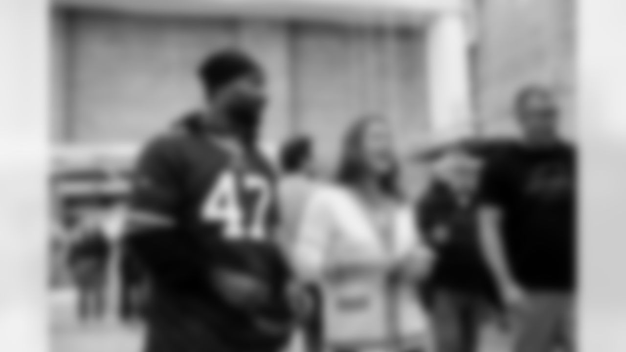 Christian Benford (47), Michelle Roberts. Buffalo Bills Social Justice Committee Trade School Visit, October 07, 2025 at McKinley High School.