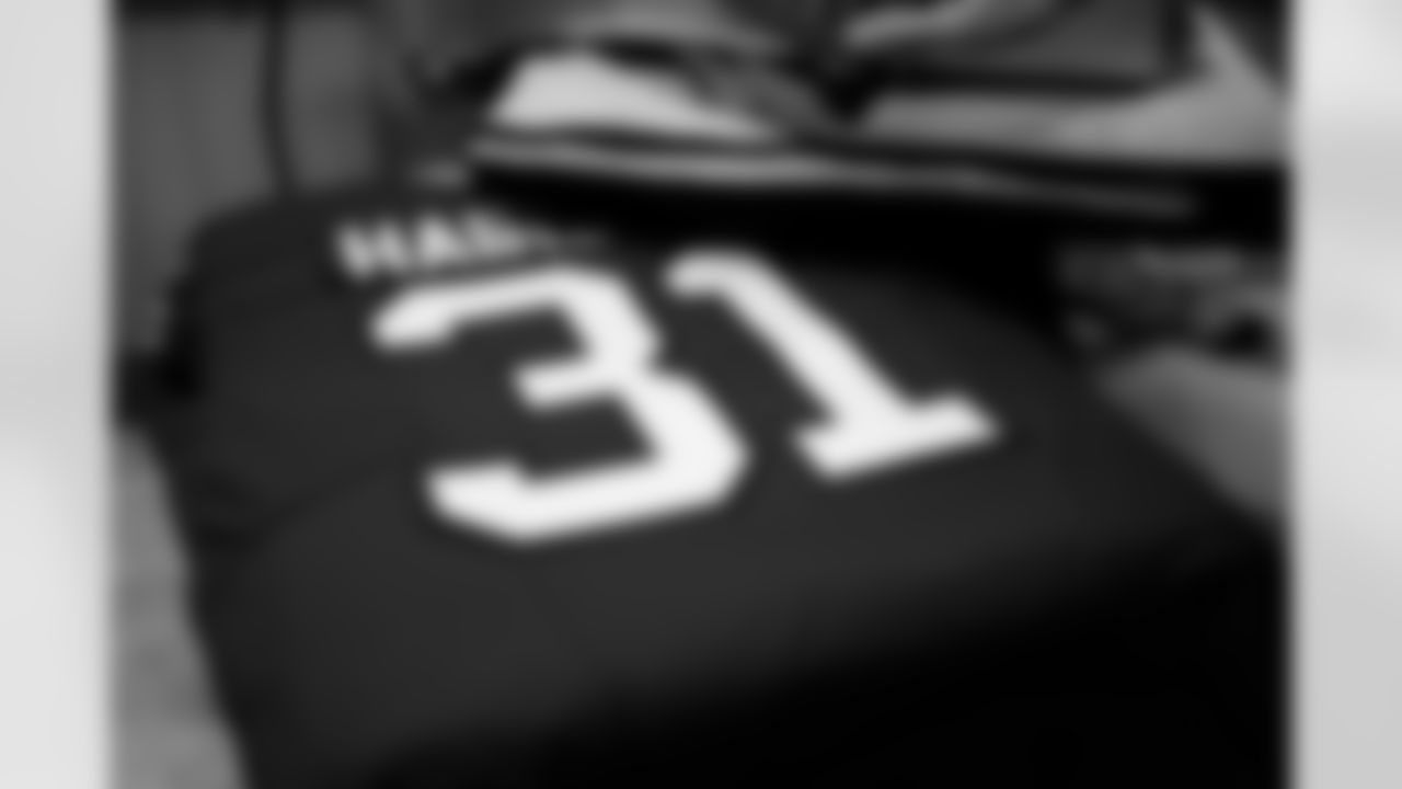 Maxwell Hairston's jersey gets stitched and heated together, April 25, 2025 at Legends.