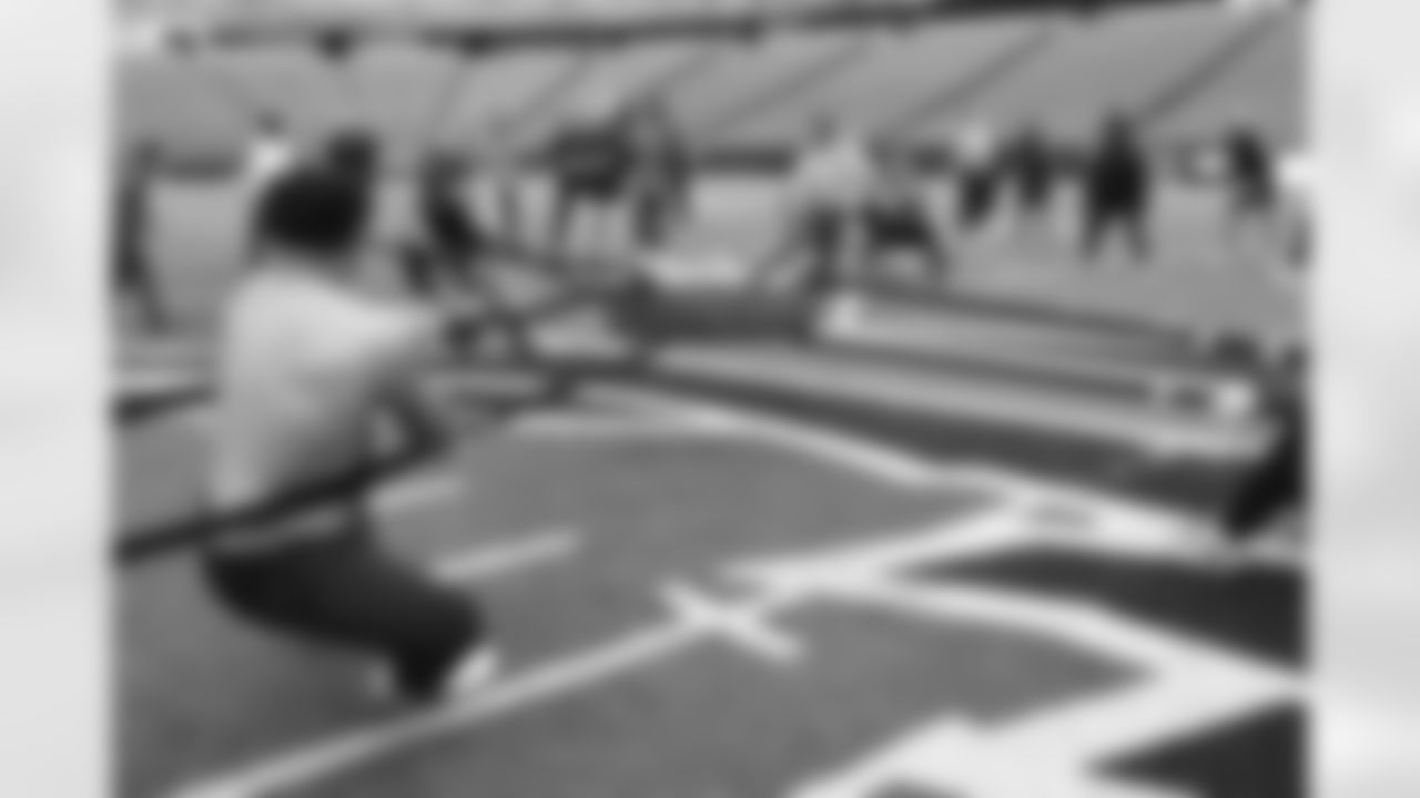 Kendrick Green, Dion Dawkins, Ryan Van Demark. Buffalo Bills players compete in a four-way tug of war during Phase Two of voluntary off-season workouts, May 19, 2025 at Highmark Stadium.
