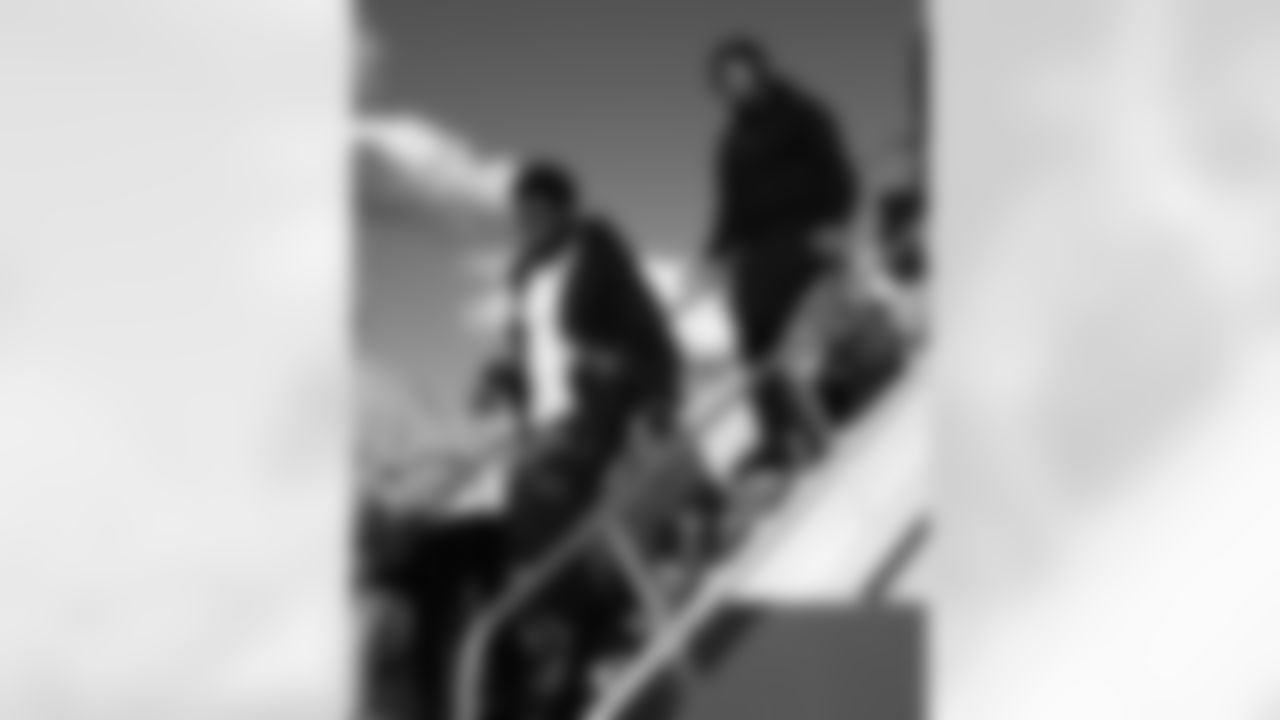 Matthew Judon (36), Tylan Grable (68). Buffalo Bills arrive in Jacksonville, January 10, 2026.