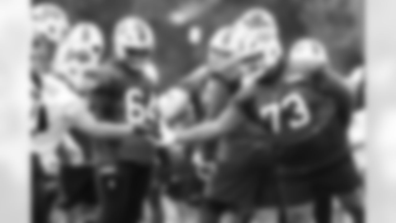 Terrel Bernard (8), Dion Dawkins (73). Buffalo Bills OTA workouts, May 27, 2025 at the Buffalo Bills Training Center.