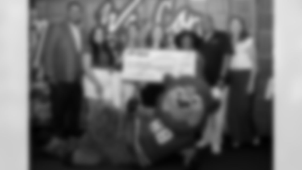 The Bills Foundation presented a $102,500 check to Buffalo Prep in support of the Prep Market, providing scholars with nutritious snacks and meals.