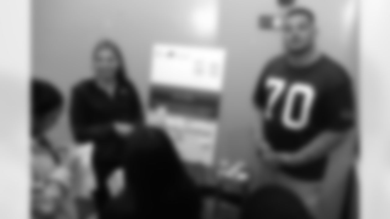 Buffalo Bills team psychologist Dr. Desaree Festa and Alec Anderson speak with students during a conversation on mental wellness best practices, May 21, 2025 at the Frank A. Sedita Academy in Buffalo.