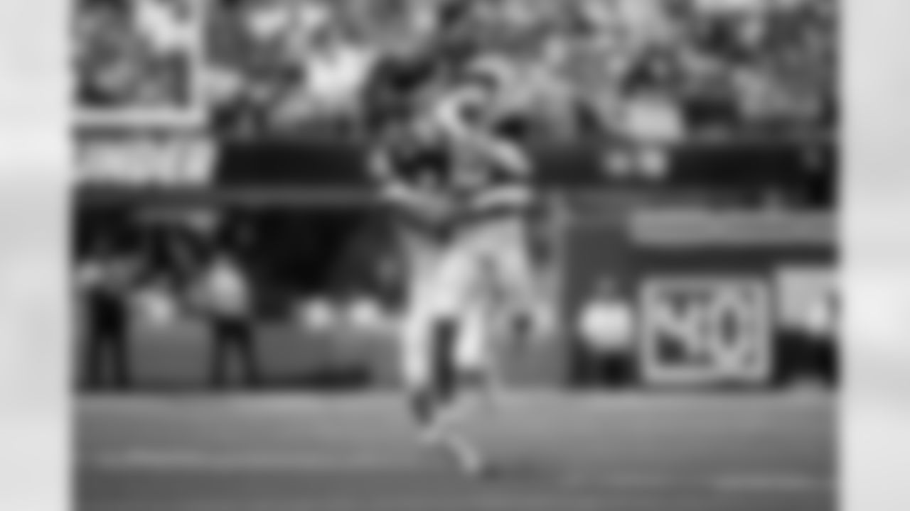 Denver Broncos safety Talanoa Hufanga (9) breaks up a pass intended for Los Angeles Chargers wide receiver Ladd McConkey (15) during the Broncos' Week 3 game against the Los Angeles Chargers at SoFi Stadium in Inglewood, California on September 21, 2025. Photo by Ben Swanson / Denver Broncos