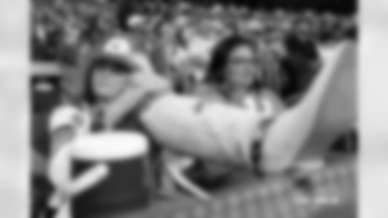 A Denver Broncos fan rests her boots during the Broncos' Week 18 game against the Los Angeles Chargers at Empower Field at Mile High in Denver, Colorado on January 4, 2026. Photo by Gabriel Christus / Denver Broncos