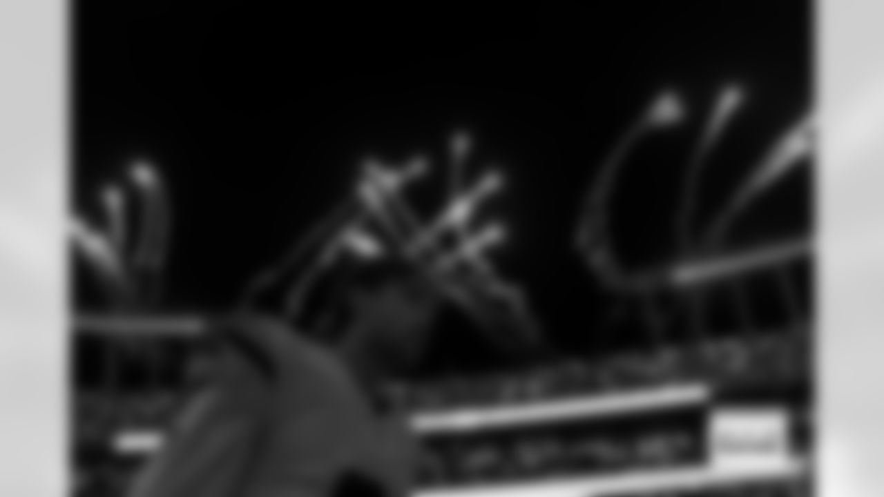 Denver Broncos cornerback Riley Moss (21) looks on as fireworks go off before the Broncos' Week 17 game against the Kansas City Chiefs at GEHA Field at Arrowhead Stadium in Kansas City, Missouri on December 25, 2025. Photo by Gabriel Christus / Denver Broncos