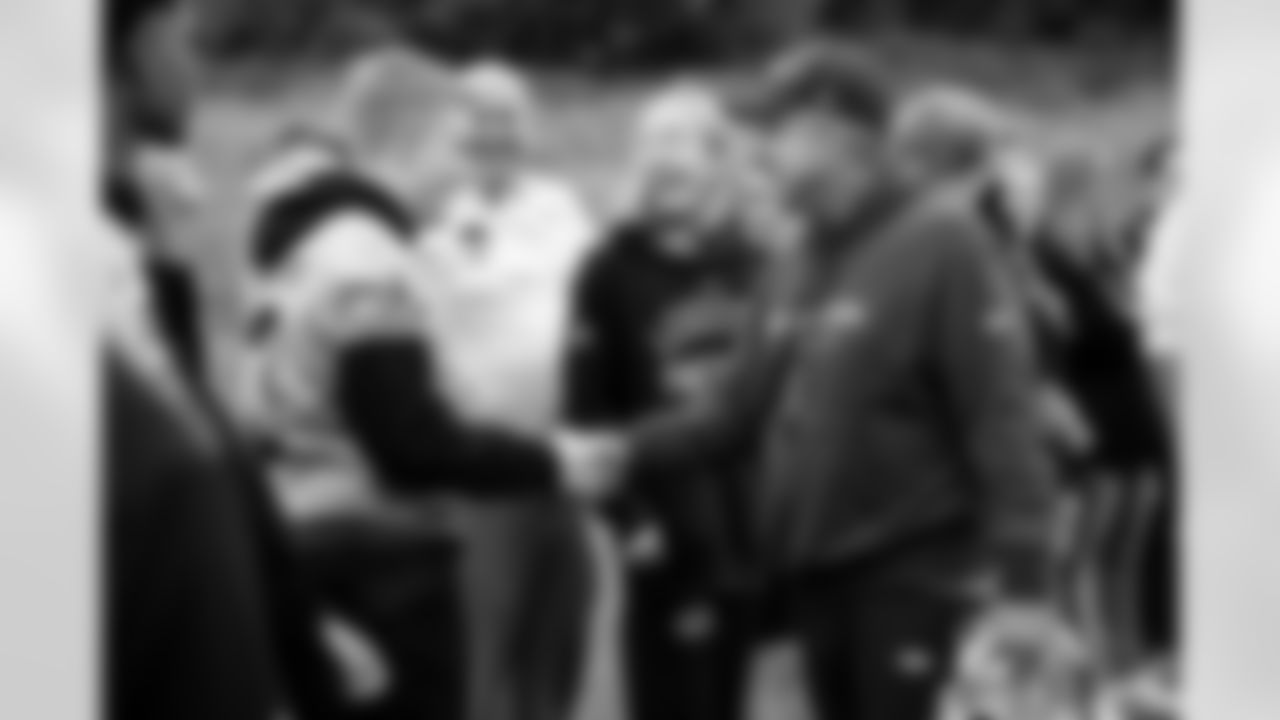 Sean Payton greets youth athletes during the Leicester Panthers' visit to practice in Ware, England on October 10, 2025. Photo by Ben Swanson / Denver Broncos