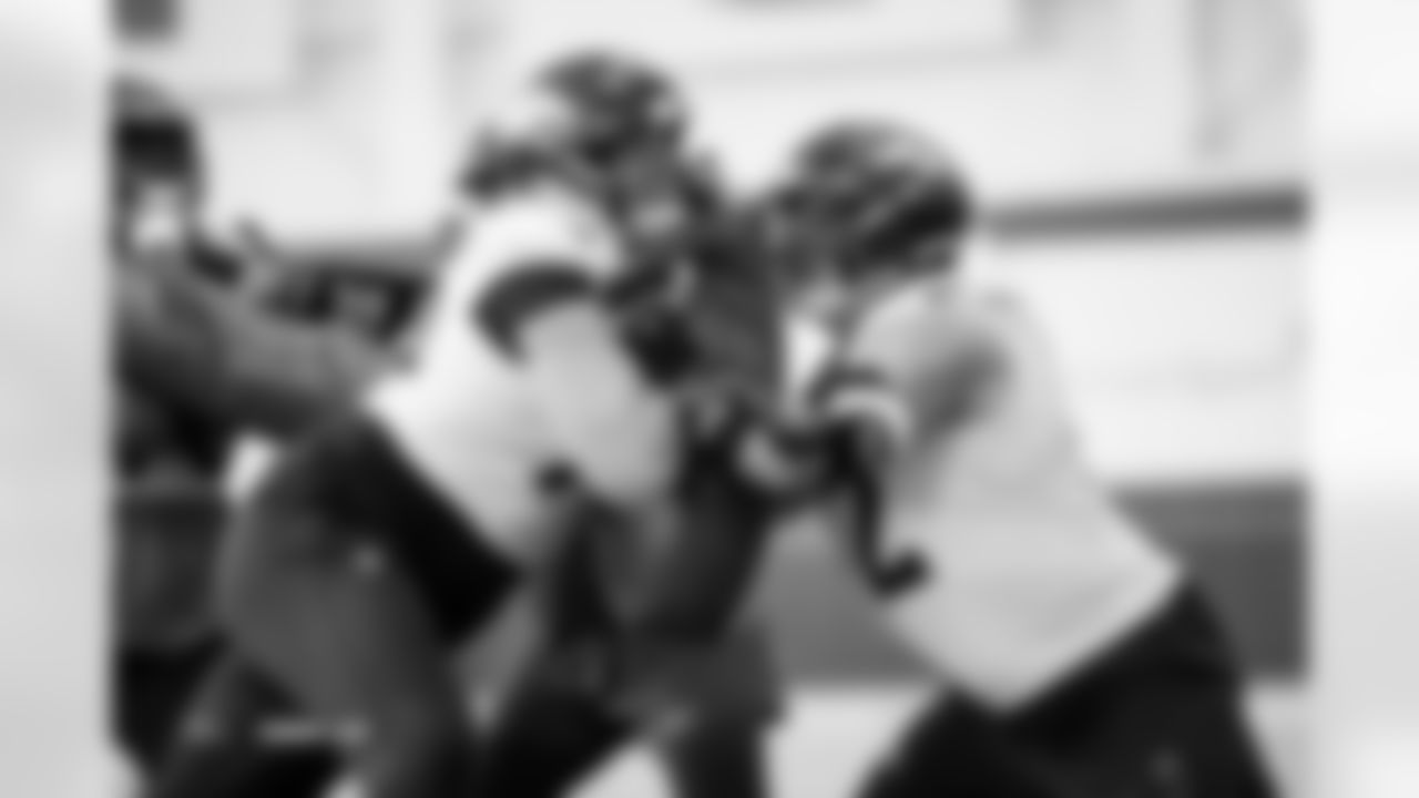 Frank Crum and Garett Bolles during practice at Broncos Park Powered by CommonSpirit in Englewood, Colorado on December 4, 2025. Photo by Ben Swanson / Denver Broncos