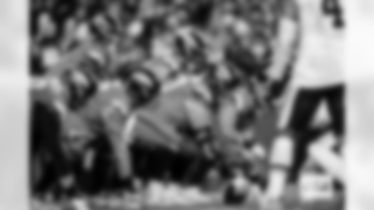 Denver Broncos center Luke Wattenberg (60) prepares to snap the ball to quarterback Bo Nix (10) during the Broncos' Week 13 game against the Washington Commanders at Northwest Stadium in Landover, Maryland on November 30, 2025. Photo by Ben Swanson / Denver Broncos