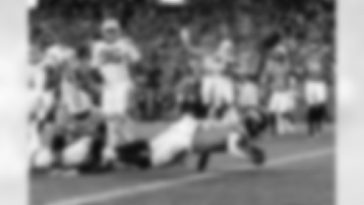 Denver Broncos running back RJ Harvey (12) stretches over the goal line for a touchdown during the Broncos' Week 15 game against the Green Bay Packers at Empower Field at Mile High in Denver, Colorado on December 14, 2025. Photo by Ben Swanson / Denver Broncos