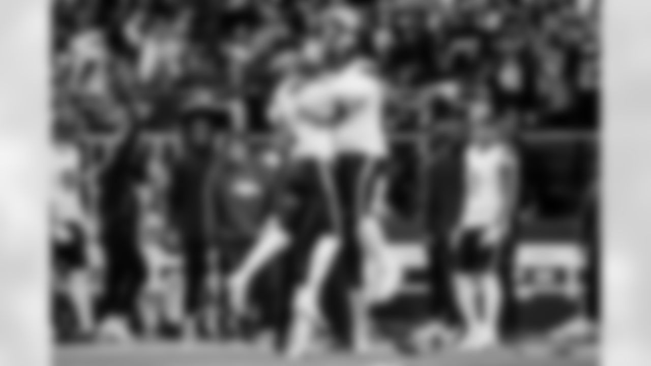 Jonathon Cooper and D.J. Jones celebrate during the Broncos' Week 6 game against the New York Jets at Tottenham Hotspur Stadium in London, England on October 12, 2025. Photo by Ben Swanson / Denver Broncos