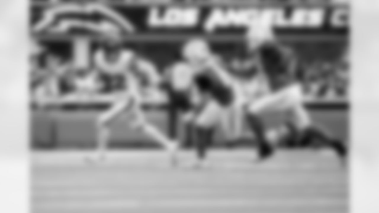 Denver Broncos safety Brandon Jones (22) runs with the ball after an interception during the Broncos' Week 3 game against the Los Angeles Chargers at SoFi Stadium in Inglewood, California on September 21, 2025. Photo by Gabriel Christus / Denver Broncos