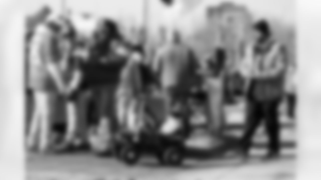 A father drives his kid around the tailgate in an rc car before the AFC Championship Game between the Denver Broncos and New England Patriots at Empower Field at Mile High in Denver, Colorado on January 25, 2026. Photo by Gavin Liddell / Denver Broncos