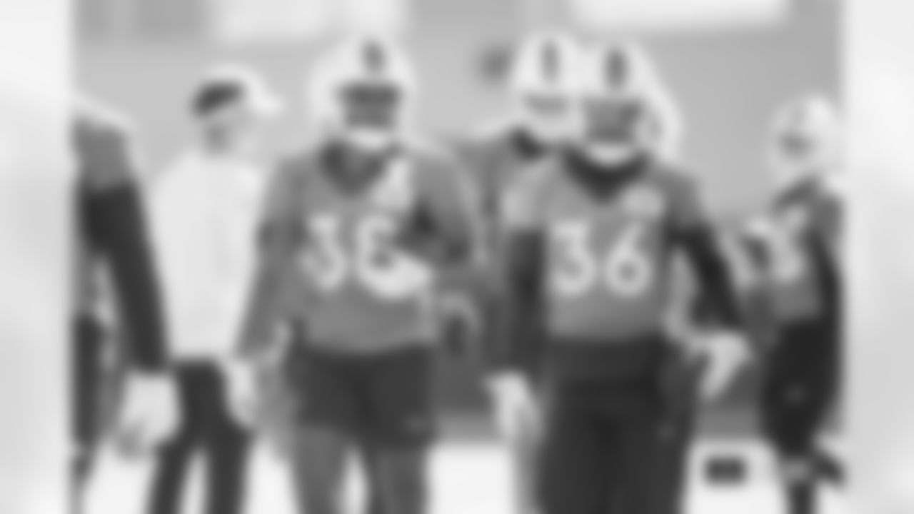 Jaleel McLaughlin and Tyler Badie during practice at Centura Health Training Center in Englewood, Colorado on December 21, 2023. Photo by Ben Swanson / Denver Broncos