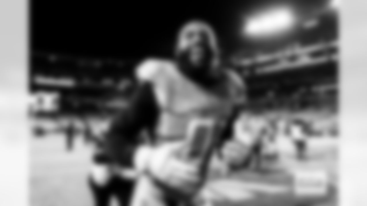 Denver Broncos linebacker Jonathon Cooper (0) smiles as he jogs off the field after the Broncos' Week 13 game against the Washington Commanders at Northwest Stadium in Landover, Maryland on November 30, 2025. Photo by Ben Swanson / Denver Broncos