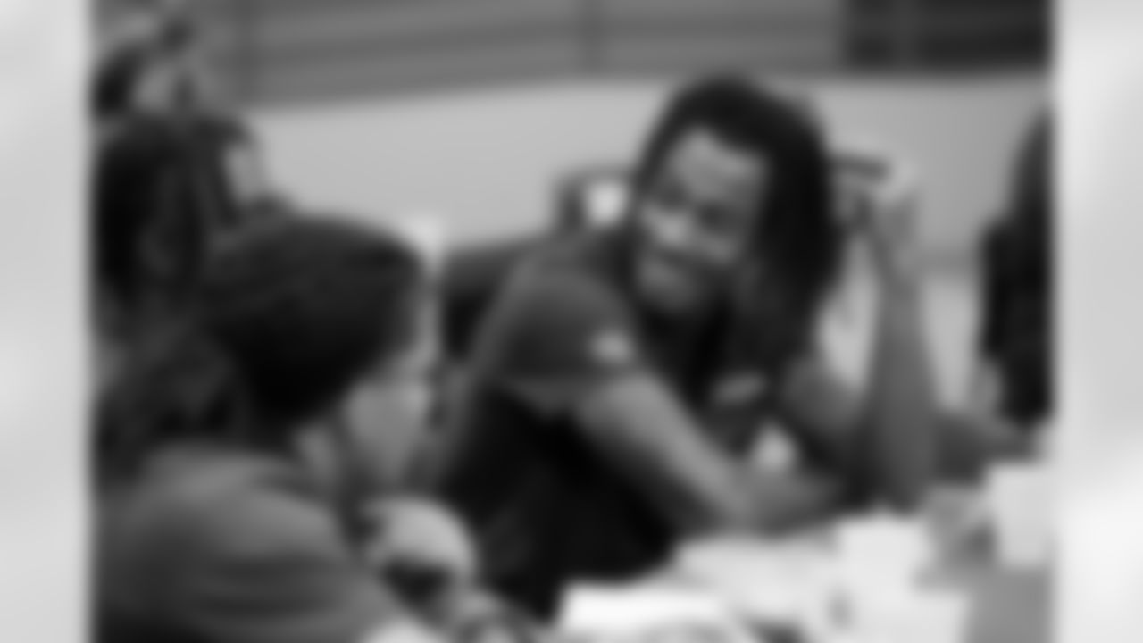 Pat Bryant talks with inmates at lunch during a visit to the Arkansas Valley Correctional Facility in Ordway, Colorado on October 14, 2025. In partnership with the Vera Institute of Justice, the Denver Broncos Foundation toured ChangeMakers Village (a Restoring Promise Unit).Photo by Gabriel Christus / Denver Broncos