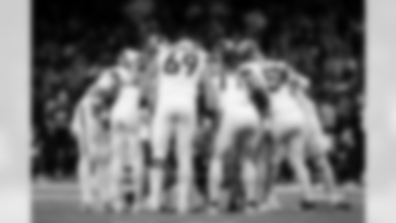 Mike McGlinchey, Quinn Meinerz, Alex Forsyth and others in a huddle on offense during the Broncos' Week 7 game against the New Orleans Saints at Caesars Superdome in New Orleans, Louisiana on October 17, 2024. Photo by Gabriel Christus / Denver Broncos