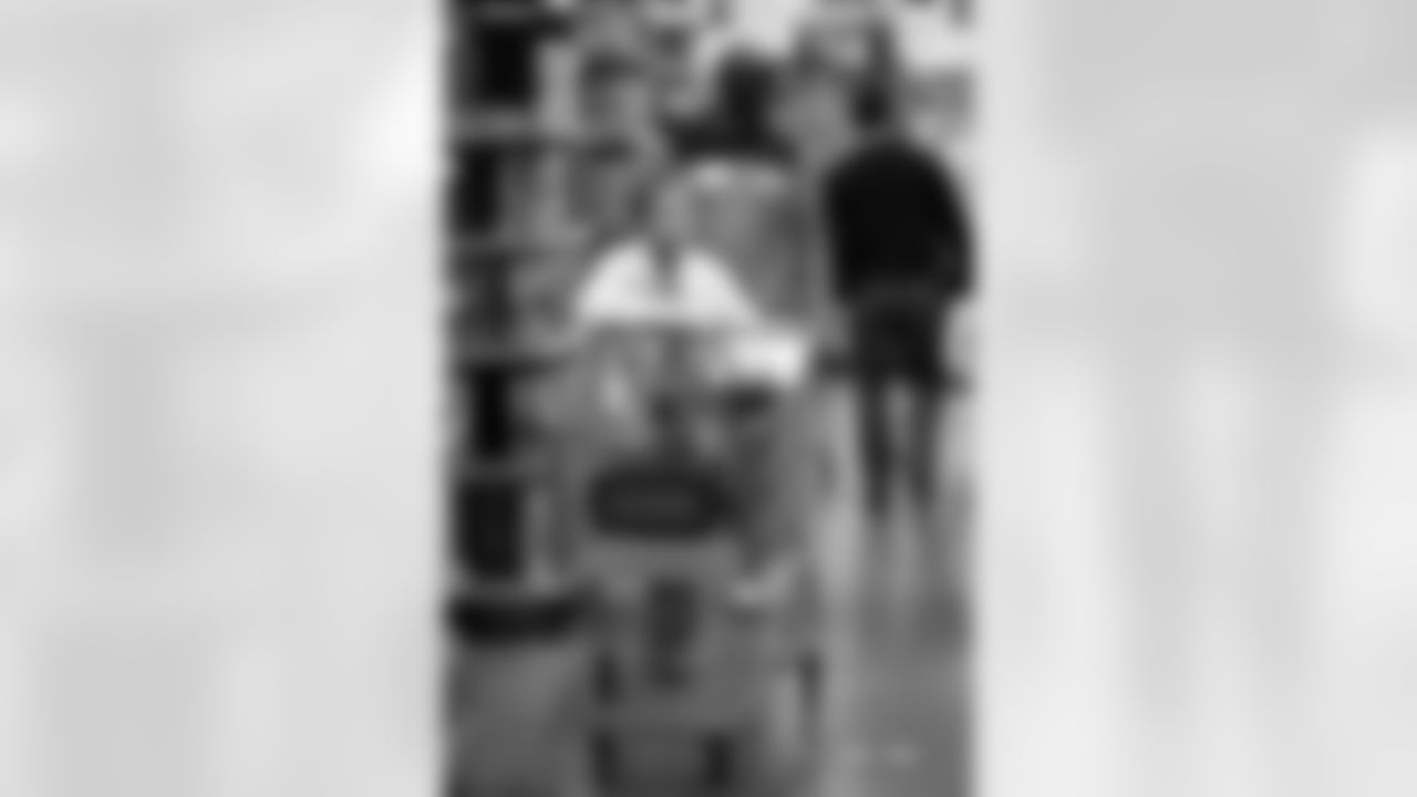 Children from the Boys & Girls Club participate in a Shop with a Jock shopping spree with Broncos players, alumni and cheerleader alumni in Aurora, Colorado on December 15, 2025. Photo by Ben Swanson / Denver Broncos