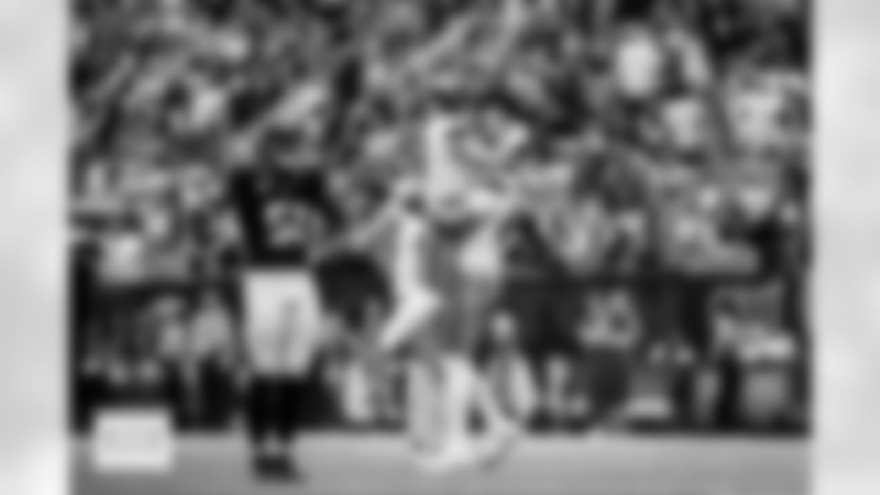 Denver Broncos quarterback Bo Nix (10) celebrates with offensive tackle Mike McGlinchey (69) after a touchdown during the Broncos' Week 9 game against the Houston Texans at NRG Stadium in Houston, Texas on November 2, 2025. Photo by Ben Swanson / Denver Broncos