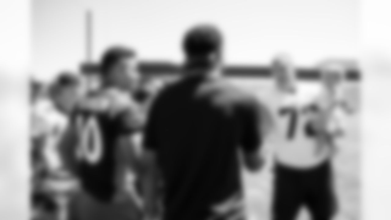 Garett Bolles during the Savannah Bananas' and The Firefighters baseball team's visit to training camp practice at Broncos Park Powered by CommonSpirit on August 12, 2025 in Englewood, Colorado. Photo by Ben Swanson / Denver Broncos