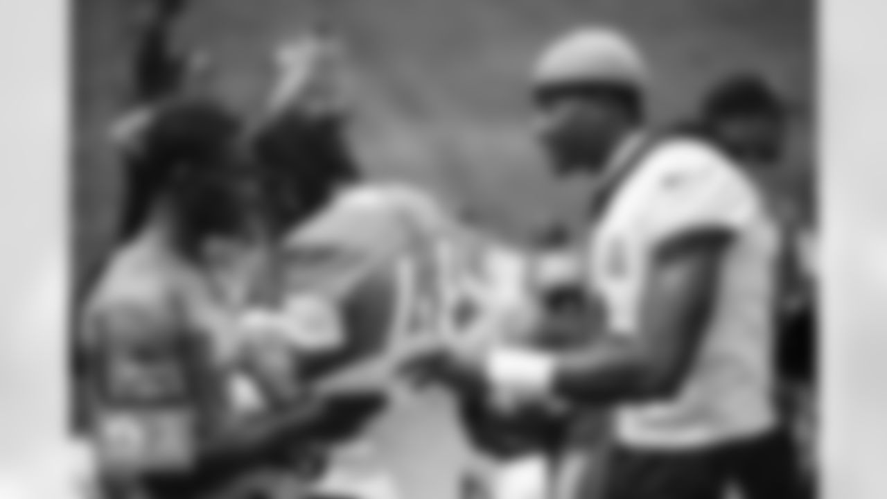 Courtland Sutton signs autographs for military members during a visit to practice in partnership with USAA at Broncos Park Powered by CommonSpirit in Englewood, Colorado on August 21, 2024. Photo by Ben Swanson / Denver Broncos