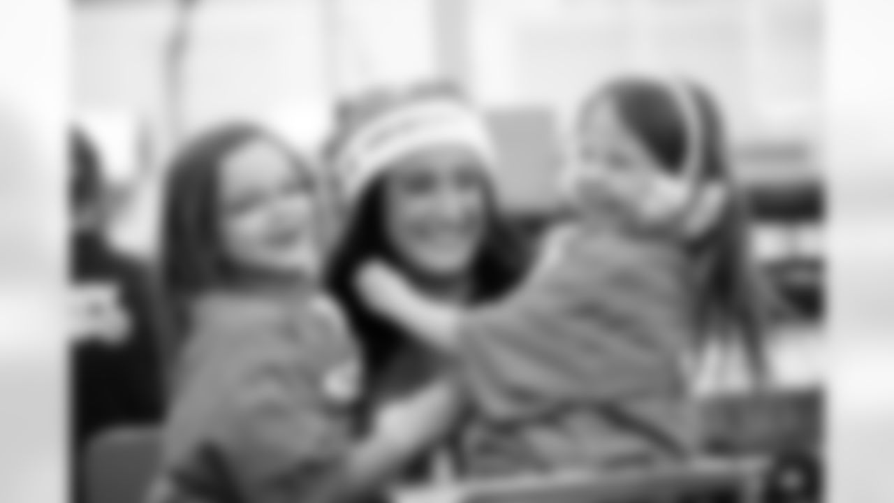 Children from the Boys & Girls Club participate in a Shop with a Jock shopping spree with Broncos players, alumni and cheerleader alumni in Aurora, Colorado on December 15, 2025. Photo by Ben Swanson / Denver Broncos