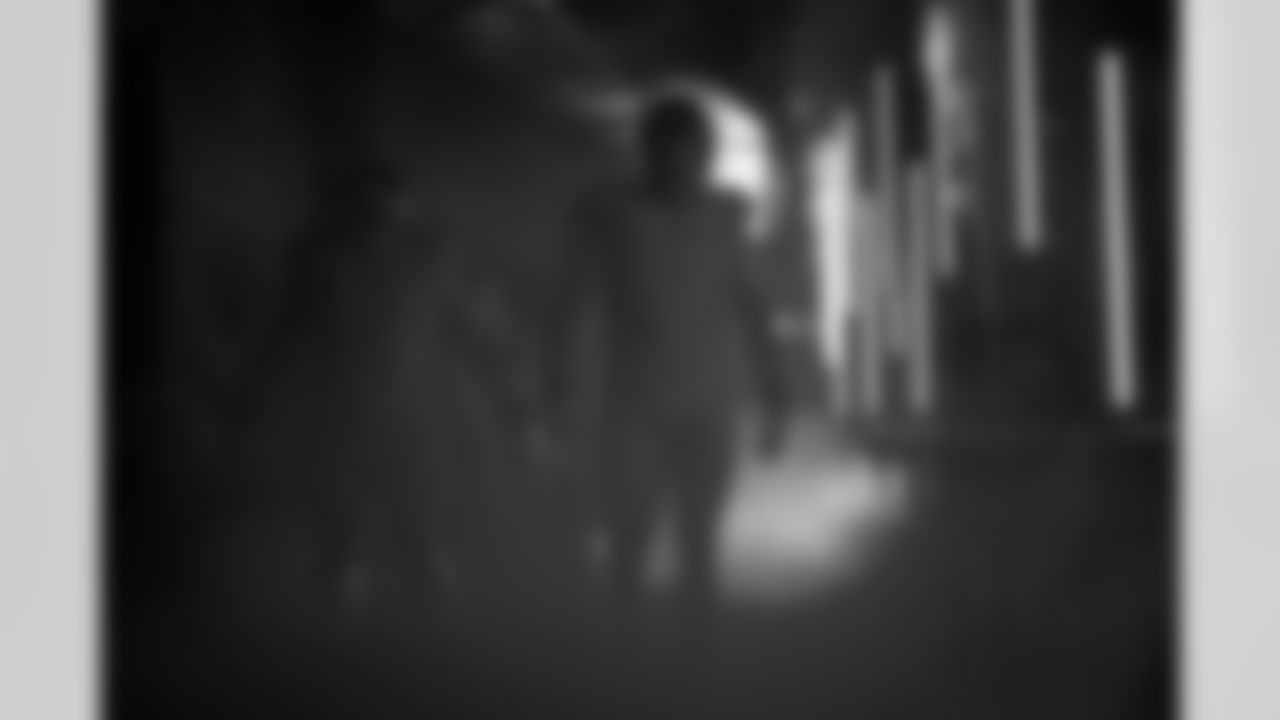 Denver Broncos offensive tackle Mike McGlinchey (69) walks through the tunnel during team and player introductions before the Broncos' Week 1 game against the Tennessee Titans at Empower Field at Mile High in Denver, Colorado on September 7, 2025. Photo by Ben Swanson / Denver Broncos