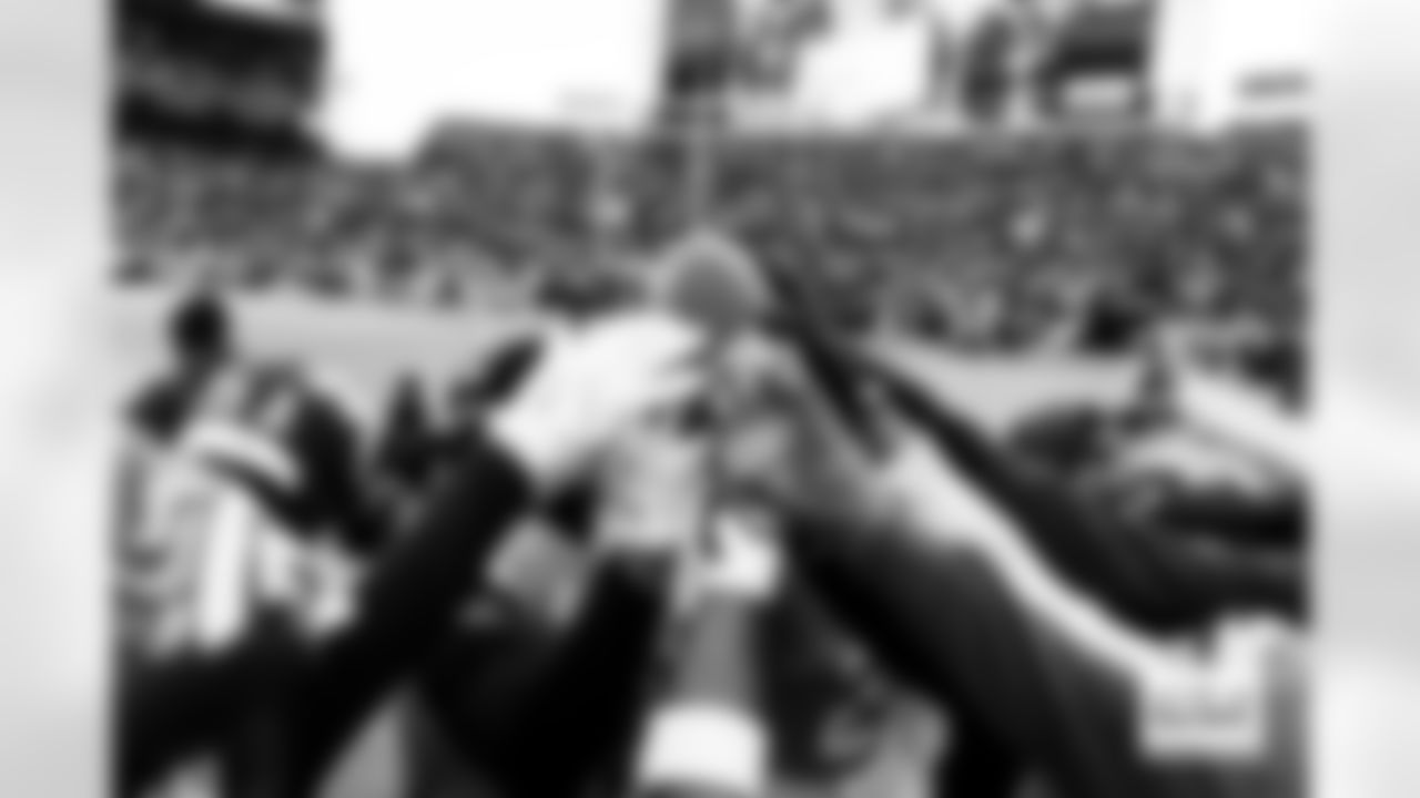 The defensive backs hold a ball up in a huddle before the AFC Championship Game between the Denver Broncos and New England Patriots at Empower Field at Mile High in Denver, Colorado on January 25, 2026. Photo by Gabriel Christus / Denver Broncos